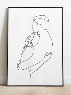 a black and white drawing of a man holding a woman