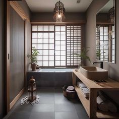 a bathroom with a large window, sink and bathtub next to a wooden shelf