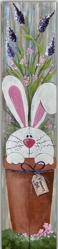 a painting of a potted plant with bunny ears on it's head and purple flowers in the background