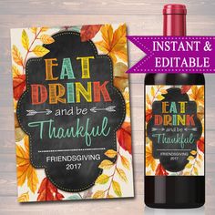 a bottle of wine next to a sign that says eat drink and be grateful