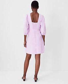 Elevate your wardrobe with the Ann Taylor Linen Blend Open Back Flare Dress, a perfect blend of elegance and comfort for any occasion. This dress features a flattering flare silhouette and a unique open back design that adds a touch of allure.

- Size: 10 Regular
- Color: Crisp Lilac
- Material: Shell - 55% Linen, 45% Viscose; Lining - 100% Cotton
- Gender: Female

Designed with a crew neck and chic 3/4 sleeves with elasticized cuffs, this dress ensures both style and ease of movement. The hidde Lavender Knee-length Midi Dress For Spring, Casual Lavender Knee-length Midi Dress, Lilac Linen Dress, Feminine Lavender V-neck Midi Dress, Spring Lavender V-neck Mini Dress, Dress With Open Back, Petite Dresses, Linen Dresses, Flared Sleeves