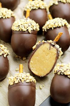 chocolate covered candies with peanut butter on top