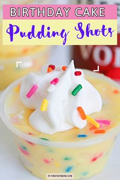 a birthday cake pudding shot in a plastic cup with sprinkles on top