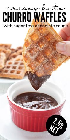 A hand dipping a keto churro waffle into a red ramekin filled with sugar-free chocolate sauce. Low Carb Breakfast Waffles, Cinnamon Churro Chaffles, Keto Sweet Waffles, Waffle Keto Recipe, Keto Churro Chaffle Recipe, Crispy Keto Waffles, Sweet Keto Chaffle Recipe, Keto Breakfast Waffles, Keto Waffles Recipe