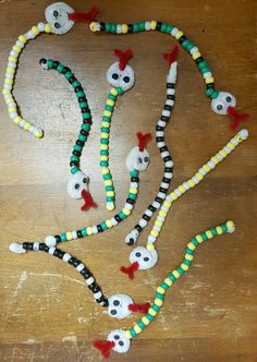 the beads are made to look like they have been decorated with skulls and other decorations