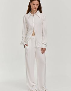 Viscose milky-white contrast-stitch straight trousers from FORMA featuring a mid-rise elasticated waistband, a concealed front fastening, side pockets, two rear patch pockets and a long length. Match this pants with contrast-stitch shirt in the same fabric from this collection. white color contrast stitching two rear patch pockets seam pockets full length Model is 178cm/5'10" (chest 85cm, waist 60cm, hips 89cm) and wearing - S size Classic White Wide Leg Pants With Pockets, White Classic Wide Leg Pants With Pockets, White Relaxed Fit Wide Leg Pants For Work, White Elastic Waistband Pants For Work, White Pants With Elastic Waistband And Straight Hem, White Pants With Elastic Waistband, Relaxed Fit Pants With Seam Detailing And Straight Hem, White Relaxed Fit Work Pants, White Straight Leg Pants For Daywear