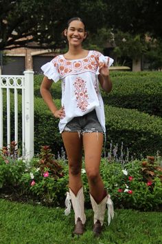 UT Shirt, Authentic Mexican Women's Shirt, Made by artists in Mexico, White with beautiful full burnt orange embroidery and fashionable ruffled sleeves. Made with lightweight Mantra Cotton. Perfect for Game Days. Easy fit and great length  Colors and designs may vary slightly as these are hand made in Mexico Care:  For best care we suggest hand washing and line dry Summer Embroidered Blouse With Ruffle Sleeves, Summer Blouse With Machine Embroidery, Embroidered Ruffle Sleeve Summer Tops, Embroidered Ruffle Sleeve Tops For Summer, Fitted Short Sleeve Embroidered Top With Ruffles, White Short Sleeve Peasant Top With Ruffles, Cotton Embroidered Top With Ruffles Short Sleeve, Traditional Summer Top With Ruffles, Traditional Ruffled Summer Top