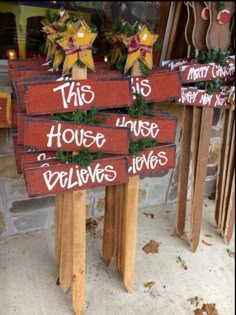 two wooden signs that say this house has valentine's day written on them