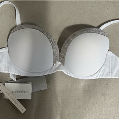 Showstopping White Bikini Top With Jewel Trim Limited Edition Dubai Style Size L Party Bra With Removable Pads In White, Summer Party Underwire Bra, White Party Bra With Removable Pads, Summer Night Out Bra With Padded Cups, White Seamless Party Swimwear, Summer Party Bra With Removable Pads, Summer Push-up Bra For Night Out, Summer Night Out Push-up Bra, White Padded Bra For Party