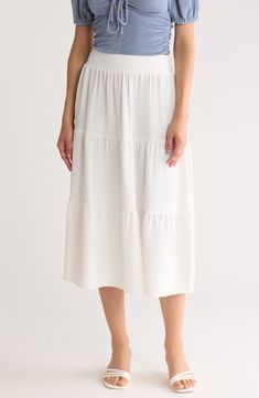 When the sun is shining, there's nothing better than a lightweight and flowy midi skirt crafted in a tiered silhouette. 31" length (size Small) Elastic waist 98% polyester, 2% spandex Machine wash, line dry Made in the USA Brunch Ruffle Hem Tiered Maxi Skirt, Tiered Gathered Skirt For Brunch, Chic Tiered Maxi Skirt For Summer, Tiered Lined Maxi Skirt For Brunch, Lined Tiered Maxi Skirt For Brunch, Relaxed Tiered Skirt For Brunch, Flowy Tiered Skirt With Layered Hem, Flowy Midi Length Skirt For Brunch, Flowy Tiered Skirt For Brunch