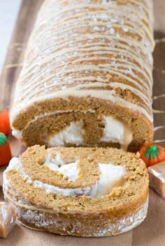 a loaf of pumpkin spice bread with cream cheese frosting