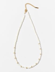 Description - Our Coral Reef Necklace is a combination of natural stone and glittering gold beads, evoking the magic of a sunlit coral reef. This dreamy necklace goes basically with everything, from a sophisticated business look to a summer dress with sandals. Premium Stainless Steel + 18k gold PVD coating Natural Mother of Pearl Stone Length ~ 15 in + 2in extender Width ~ 4mm Water-Resistant Hypoallergenic All orders come with free stickers!*gift ready* Elegant Summer Jewelry With Faceted Beads, Elegant Beach Necklace With Faceted Beads, Elegant Beach Necklaces With Faceted Beads, White Beaded Necklace With Gold Beads For Summer, Elegant Polished Beads Necklace For Beach, Gold Round Beads Choker For Summer, Delicate Gold Beaded Crystal Necklaces, Gold Choker With Round Beads For Summer, Delicate Gold Beaded Crystal Necklace