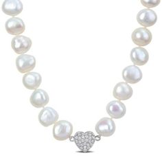 Elevate your elegance with our 20-inch Cultured Freshwater Pearl Strand & Heart-Shape Cubic Zirconia Necklace. Adorned with 11-12mm pearls, this necklace exudes opulence, while heart-shape cubic zirconia accents add a modern touch of glamour. Whether for a special occasion or everyday luxury, this piece effortlessly blends classic and contemporary styles, making it a versatile statement of sophistication. | Belk & Co 11-12mm Freshwater Cultured Pearl and Cubic Zirconia Necklace with Sterling Sil White Cubic Zirconia Necklace With Heart Charm, White Heart Charm Necklace In Cubic Zirconia, Classic White Necklace With Heart Charm, Classic White Heart Necklace For Valentine's Day, Anniversary Pearl Necklace With Heart Charm, Elegant Heart-shaped Single Strand Jewelry, Elegant Single Strand Heart Jewelry, White Pearl Heart Pendant Necklace For Anniversary, White Heart-shaped Diamond Accent Necklace