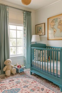 a baby's room with a blue crib and map on the wall