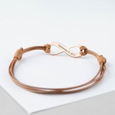 ♥ LEATHER INFINITY COORDINATES BRACELET ♥• Material: Solid 925 Sterling Silver • Finishing: Silver - Yellow Gold - Rose Gold • Word limits: 3-4 wordsH O W • T O • O R D E R1. Select your preferred CHARM COLOR and 1 SIDE / 2 SIDES ENGRAVING from the menu. 2. Select your preferred LEATHER COLOR from the menu.3. Please let us know the coordinates or messages in the "Note to GRSJewelry" section during checkout. If you don't know the exact coordinates, leave us the address and we will look up the coo Personalized Elegant Leather Bracelet As Gift, Personalized Elegant Leather Bracelet Gift, Elegant Personalized Leather Bracelet Gift, Elegant Personalized Leather Bracelet For Gift, Brown Leather Strap Wrap Bracelet Gift, Elegant Adjustable Engraved Leather Bracelet, Adjustable Leather Strap Jewelry With Waxed Cord, Brown Leather Strap Braided Bracelet Gift, Brown Resizable Jewelry For Gifts