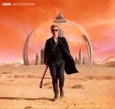 a man in a suit and tie walking across a desert with a sci - fi background