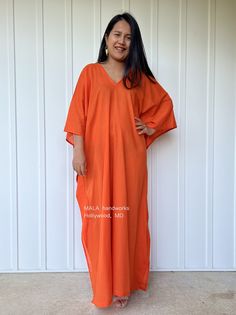 "Top Rated Kaftans by Oprah Daily, Byrdi, Cosmopolitan, Elle, and more...  DETAILS * Oversized  * Bust/Waist/Hips 34\" wide, circumference 68\" * Approx. 55\" long from shoulder to hem  * V neckline both front & rear  * Loose silhouette * Side slits  * Slipover style  * Cotton gauze fabric * Gentle machine wash with low heat dry, first wash separately  * Model is 5'4\"/164 cm. * Style O-" Oversized Long Kaftan For Beach, Oversized Tunic Kaftan For Beach Season, Orange Cotton Maxi Dress For Vacation, Traditional Orange Maxi Dress For Summer, Oversized Tunic Maxi Dress For Beach Season, Relaxed Fit Loose Beach Dress, Casual Orange Kaftan For Summer, Oversized Maxi Beach Tunic, Oversized Maxi Tunic For Beach