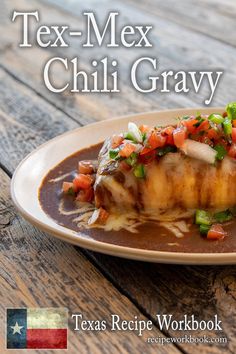 tex - mex chili gravy on a plate with the texas recipe workbook