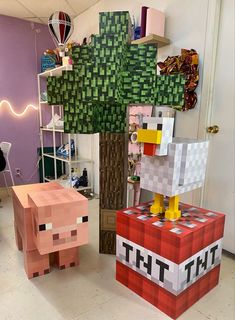 some paper toys that are on display in a room