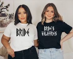 two women standing next to each other wearing t - shirts that say girls trip and las vegas