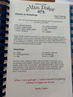 a recipe book with instructions for chicken and dumplings on it sitting on a table