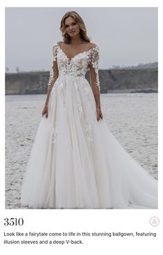 a woman in a white wedding dress standing on the beach with her hand on her hip