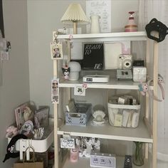 a shelf filled with lots of items in a room