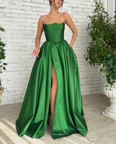 Forest Green Taffeta Gown - Teuta Matoshi Green Satin Gown With Pleated Bodice, Green Ball Gown With Fitted Bodice For Prom Season, Green Prom Gown With Pleated Bodice, Green Ball Gown With Fitted Bodice, Green Ball Gown With Fitted Bodice For Evening, Green Evening Dress With Corset Back For Gala, Green Gown With Sweep Train And Fitted Bodice, Green Fitted Ball Gown For Debutante Ball, Green Pleated Bodice Evening Dress For Gala