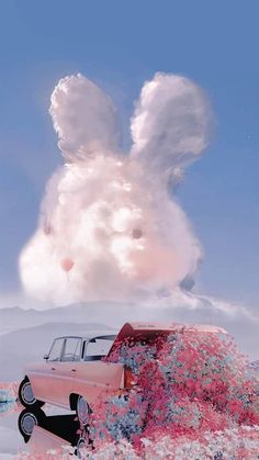 an old car in the middle of a field with clouds and flowers on it's roof