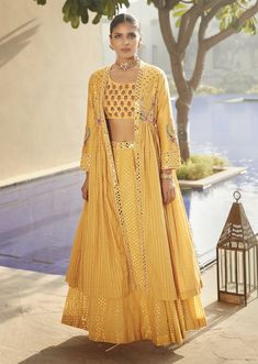 Matsya-Haldi Yellow Venetian Tripitaka Lehenga Set-INDIASPOPUP.COM Yellow Sharara, Jacket Lehenga, Cape For Women, Yellow Lehenga, Embellished Blouse, Cropped Blouse, Sharara Set, Indian Fashion Designers, Long Jacket