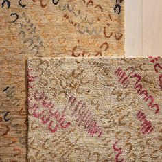 three rugs with different colors and designs on them