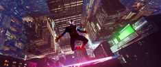 a man flying through the air over a city at night