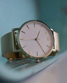 The Voyager features a sleek, slim design for the minimalist in anyone. Accompanying this watch are gold plated stainless steel mesh bands that mold to your wrist with just the right amount of steel to avoid any hair pulling. Measuring 36mm wide with a Quartz Japanese movement that powers this little lady, rest assured you'll be on time. SEE WARRANTY Gold Minimalist Watch For Everyday Use, Gold Minimalist Watch For Everyday, Everyday Gold Minimalist Watch, Gold Minimalist Everyday Watch, Minimalist Gold Watch With Metal Dial, Gold Minimalist Watch With Metal Dial, Minimalist Gold Watches, Branded Sunglasses, Be On Time