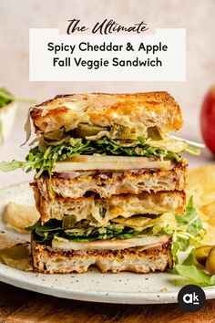 the ultimate spicy cheddar and apple fall veggie sandwich on a plate