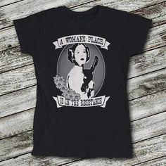 Get your product: Star Wars Women's Shirt Princess Leia T-Shirt A Woman's Place is in the Resistance
1. PRODUCT INFORMATION:

Proudly printed in America
5.3 oz, unisex fit
Heavy cotton, classic midweight fabric
Material: 100% cotton | Dark Gray: 50% cotton:50% polyester | Light Gray: 90% cotton:10% polyester
Double-needle stitched neckline, bottom hem, and sleeves
Quarter-turned to eliminate center crease
7/8 inch collar
Tear-away label
Machine-wash safe
Copyrighted artwork
2. SIZE CHART:
3. RET Starwars Fashion, Princess Leia Shirt, Leia Star Wars, Star Wars Shirt, Star Wars Tees, Star Wars Women, Ladies Shirts, Feminist Shirt, Womens March