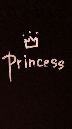 the word princess written in white chalk on a black background