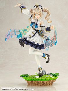 an anime figurine is posed in front of a white background and green grass