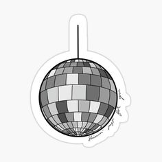 a black and white photo of a disco ball sticker