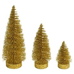 three gold tinsel christmas trees on white background