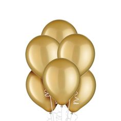 a bunch of gold balloons are in the air