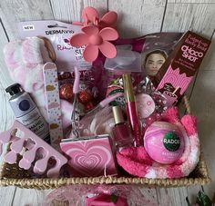 a basket filled with lots of pink items