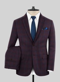 Experience a sophisticated and refined style with our Reda Elupi Checks Wool Suit, designed to make you feel your best. This elegant suit is crafted from pure wool and offers a sleek and classic look. The stylish purple-blue plaid pattern adds a touch of chicness and modernity, making it a perfect choice for those who seek a streamlined and polished look.  Look Includes    Reda Elupi Checks Wool  Fabric  Two Button Jacket Style  Notch Lapel   Horn Brown  Buttons  Single Vent  Three Cuff Buttons Elegant Tailored Plaid Three-piece Suit, Classic Fitted Plaid Three-piece Suit, Luxury Fitted Plaid Three-piece Suit, Classic Tailored Plaid Three-piece Suit, Classic Single-breasted Plaid Suits, Grey Tweed Suit, Green Velvet Jacket, Herringbone Tweed Jacket, White Linen Suit