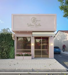 an image of a store front with cars parked outside