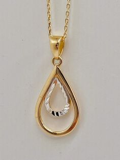 "Experience the captivating elegance of our Tear Drop Gold Necklace. This exquisite piece features a delicate tear drop-shaped pendant, meticulously crafted from 14k solid gold. The pendant gracefully suspends from a dainty chain, adding a touch of grace and sophistication to any ensemble. Its timeless design and shimmering brilliance make it a versatile accessory for both casual and formal occasions. Embrace the allure of this Tear Drop Gold Necklace and let its beauty become a cherished part o Mothers Day Special, Gold Cross Pendant, Luxury Necklace, Dainty Chain, 14k Gold Necklace, Vermeil Jewelry, Teardrop Necklace, Necklace Dainty, Drop Necklace