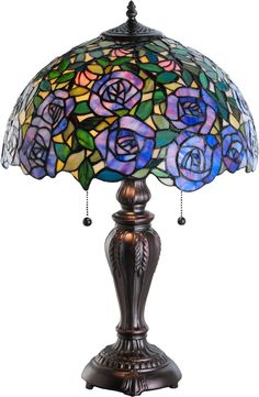 a stained glass lamp with roses on it