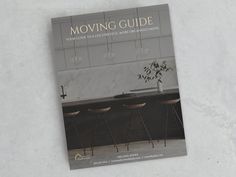 the cover of moving guide on a white wall