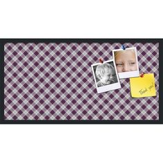 a purple and white checkered table cloth with two photos on it, pinned to a clipboard