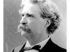 an old black and white photo of a man in a suit with a moustache