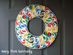 a door with a wreath made out of letters and numbers