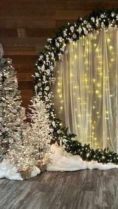 a white christmas wreath with lights on it